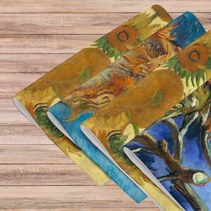 This stunning set of 4 placemats feature the infamous Sunflower paintings by Vincent Van Gogh. The most famous mostly yellow painting, and two with blue backgrounds. The contrasting yellows and blues will brighten up any table!