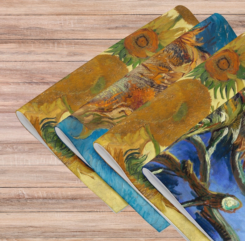 This stunning set of 4 placemats feature the infamous Sunflower paintings by Vincent Van Gogh. The most famous mostly yellow painting, and two with blue backgrounds. The contrasting yellows and blues will brighten up any table!