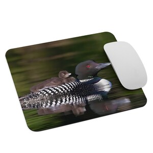 This beautiful mouse pad features a loon "mama" with her baby. We are proud to have the common loon as our Minnesota state bird!