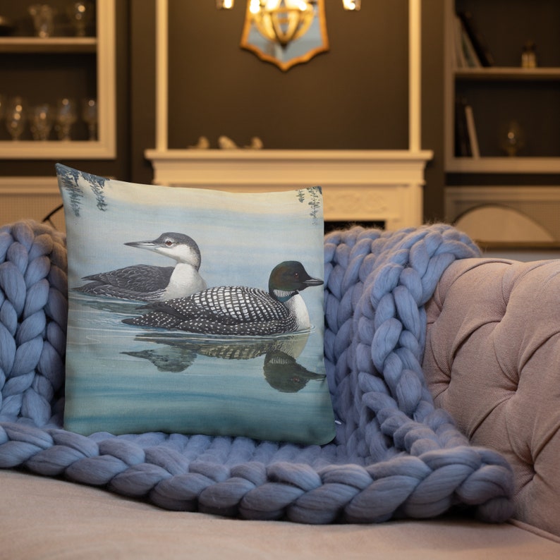 This beautiful pillow comes in two sizes, 18x18 or 22x22 inch and features a painting of an adult and immature common loon. The amazing state bird of Minnesota! The perfect addition to any living room or cabin!