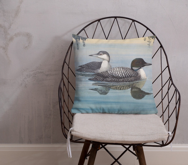 This beautiful pillow comes in two sizes, 18x18 or 22x22 inch and features a painting of an adult and immature common loon. The amazing state bird of Minnesota! The perfect addition to any living room or cabin!