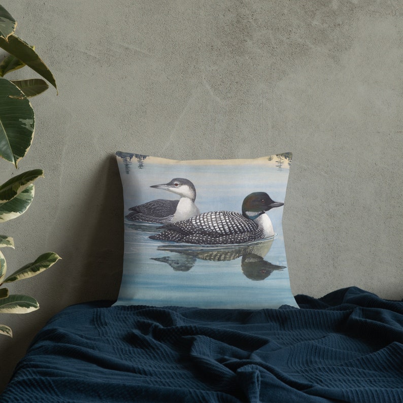This beautiful pillow comes in two sizes, 18x18 or 22x22 inch and features a painting of an adult and immature common loon. The amazing state bird of Minnesota! The perfect addition to any living room or cabin!