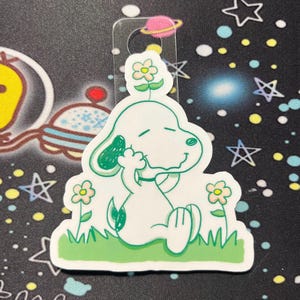 Sticker printanier chien fleur - Fans d'art, sticker dessin animé esthétique, décalcomanies, vinyle pour bouteilles d'eau/ordinateurs portables (résistant à l'eau)