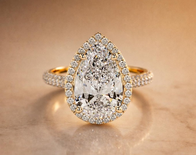 Featured listing image: 4 Carat Pear Lab Grown Diamond Halo Ring | 14K Yellow Gold