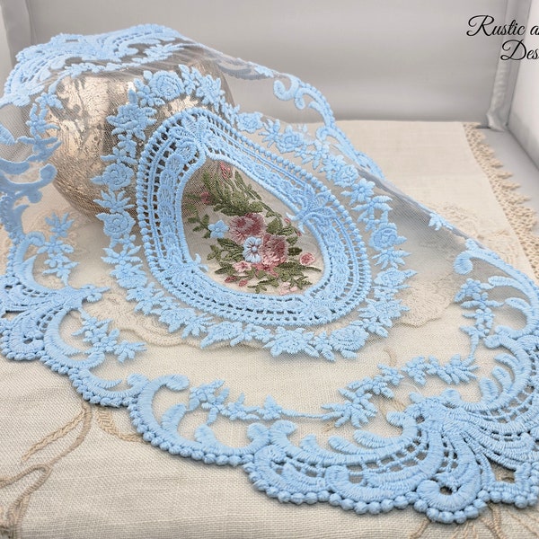 Light Blue Oval Doily with Net Lace, Intricate Embroidering, and Soft Blue, Pink and Mauve Rose Flowers in the Center (12" x 16.5") (B)