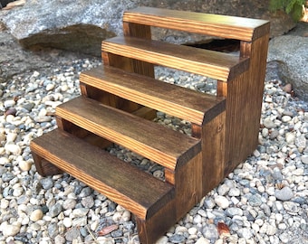 Solid pine wood tiered spice rack display stand for countertop.