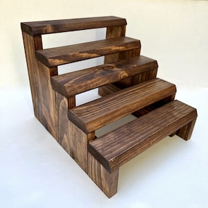 Solid pine wood tiered spice rack display stand for countertop.