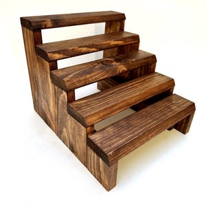 Solid pine wood tiered spice rack display stand for countertop.