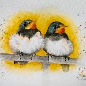May include: Watercolour painting of two birds perched on a branch. The birds are brown, white and blue with orange beaks. The background is a yellow watercolour wash with white splatters.