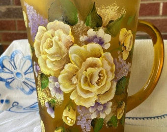 HandPainted frosted Amber colored pitcher with soft yellow roses and lilacs