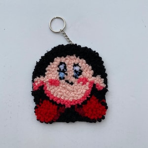 Kirby Handgetufteter Teppich Schlüsselanhänger