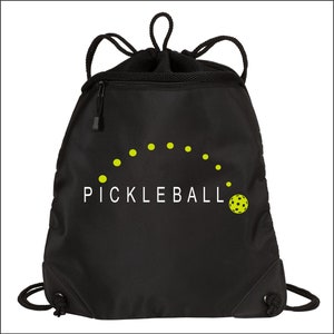 May include: Black drawstring bag with a white "Pickleball" logo and a yellow pickleball graphic.