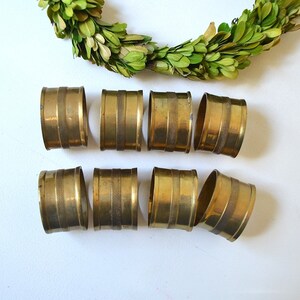 vintage set of 8 golden brass napkin rings brass table decor image 1