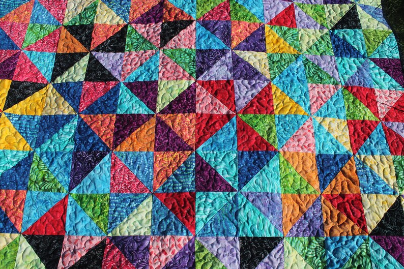 Pinwheelskaleidoscopequiltcolorfulfree-motionblanketthrowboundless batik collectionhalf-square triangles