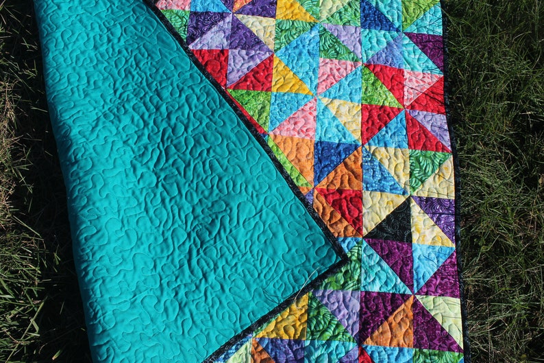 Pinwheelskaleidoscopequiltcolorfulfree-motionblanketthrowboundless batik collectionhalf-square triangles