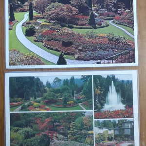 May include: A postcard featuring a collage of photos of the Butchart Gardens in Victoria, British Columbia, Canada. The top photo shows a winding path through a colourful flower garden. The bottom left photo shows a Japanese garden with a red bridge. The bottom right photo shows a fountain and a building.