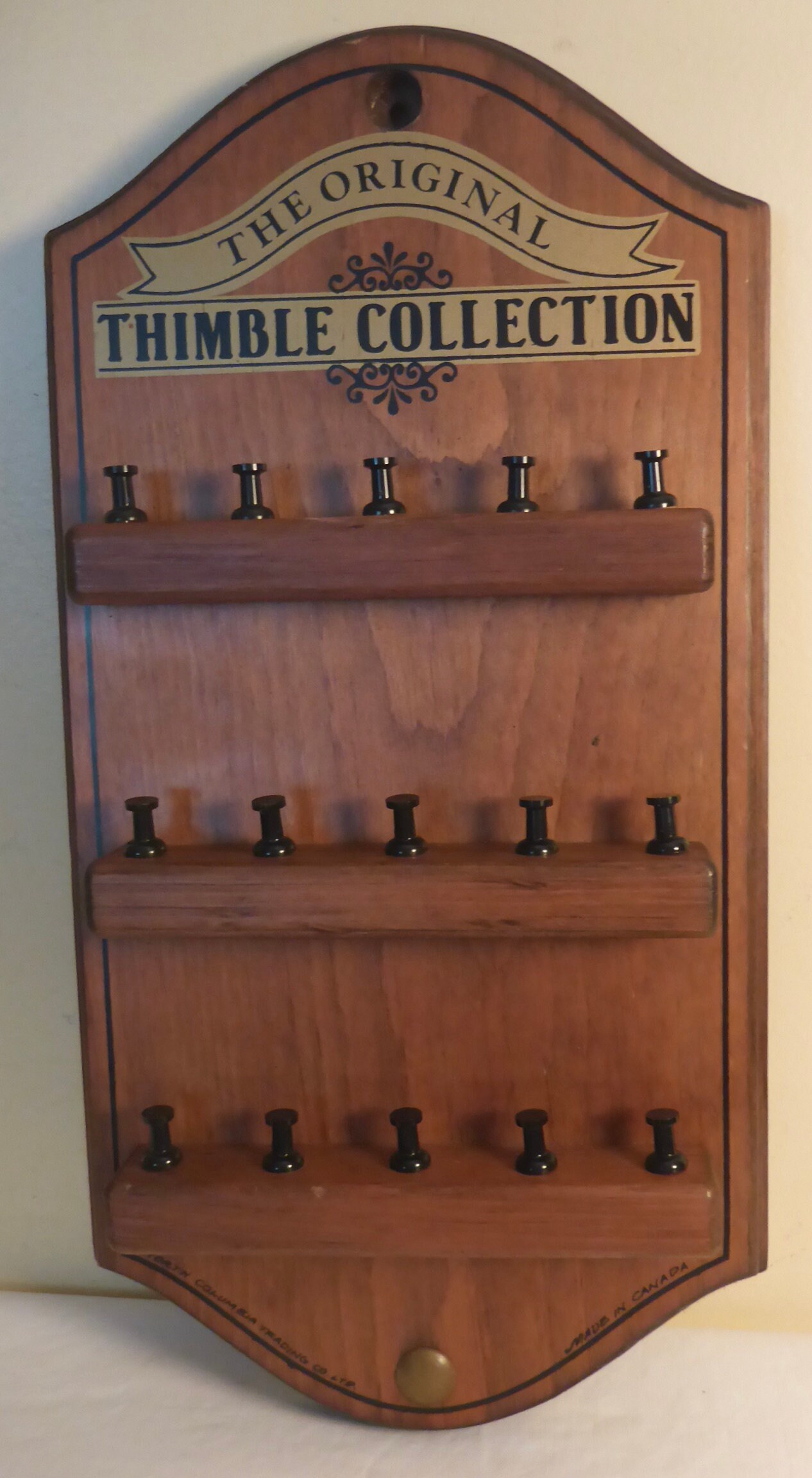 Large wooden thimble display case and approx 100+ china thimbles