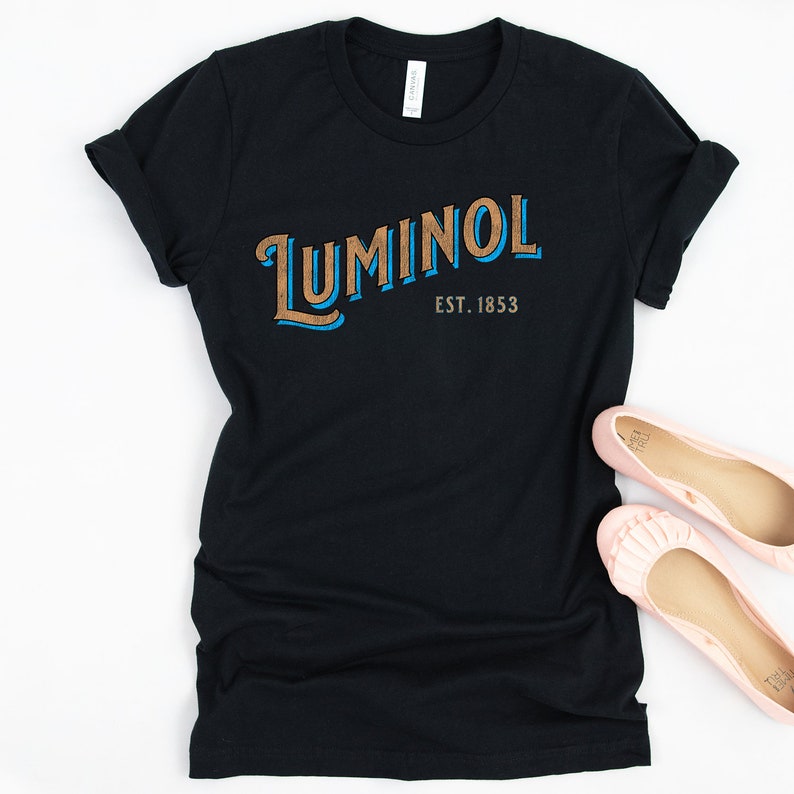 May include: Black t-shirt with a gold and blue graphic that says "Luminol Est. 1853"