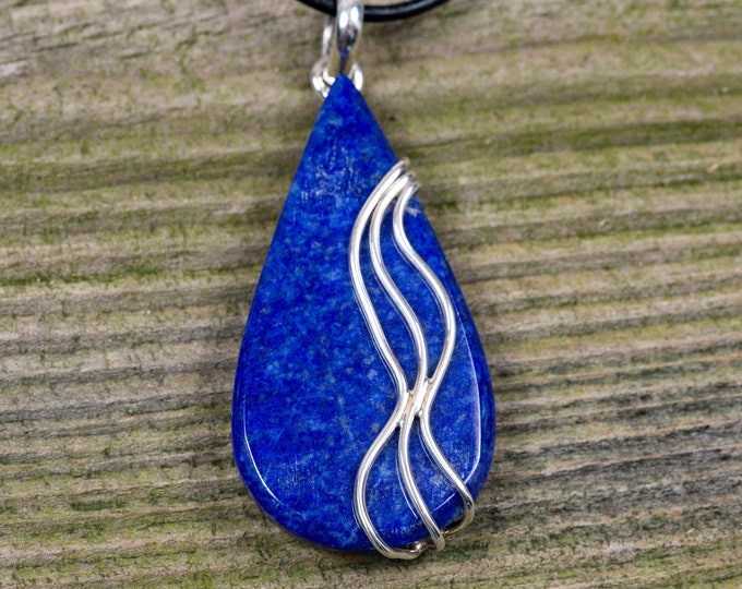 Unique Lapis Lazuli Pendant fitted in Sterling Silver setting. Lapis Lazuli pendant. Designer pendant. Contemporary pendant. Lapis jewelry
