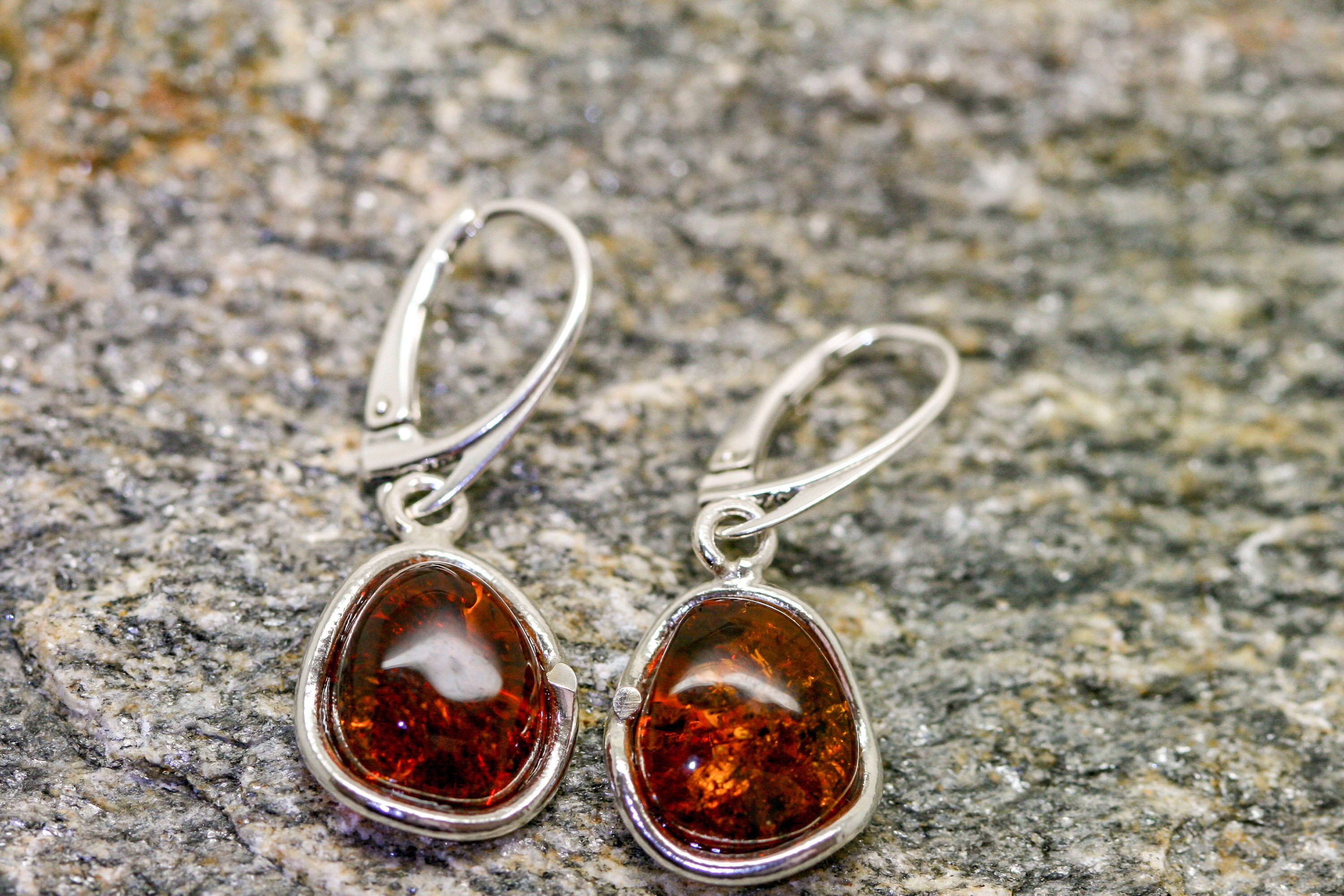 Baltic Amber Earrings fitted in a Sterling Silver setting. Big silver