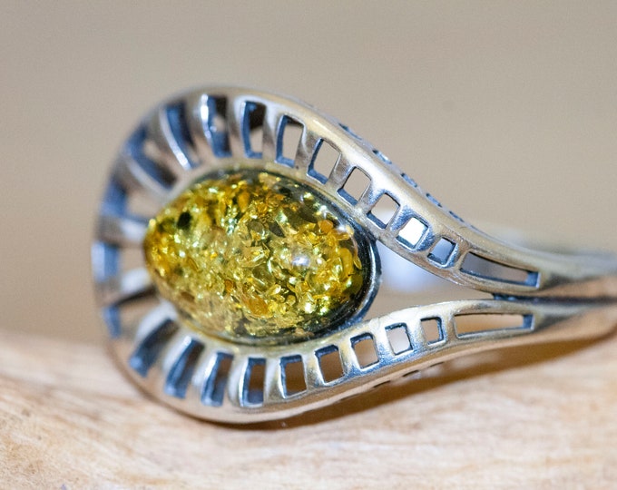 Baltic amber ring. Green kind of Baltic amber. Sterling silver setting. Perfect gift. Designer ring. Amber jewelry. Celtic design. Unique.