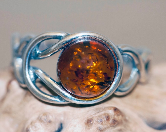 Baltic amber ring. Sterling silver setting. Perfect gift. Designer ring. Amber jewelry. Celtic knot design. Unique. Original ring.