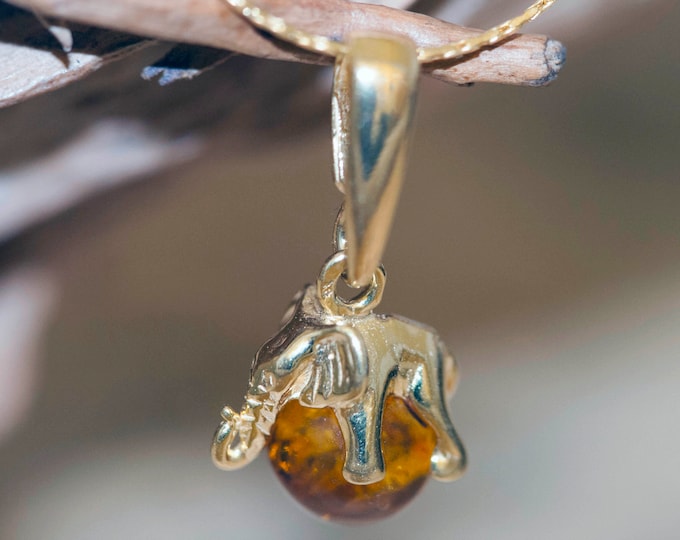 Amber & Gold. Baltic amber pendant. Elephant shaped. Perfect gift. Golden pendant. Elegant pendant. Animal pendant. Contemporary jewelry.