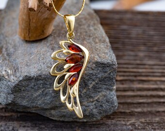 Amber & Gold. Angel Wing amber pendant. Golden pendant. Perfect gift. Elegant pendant. Contemporary pendant. Designer pendant. Unique.