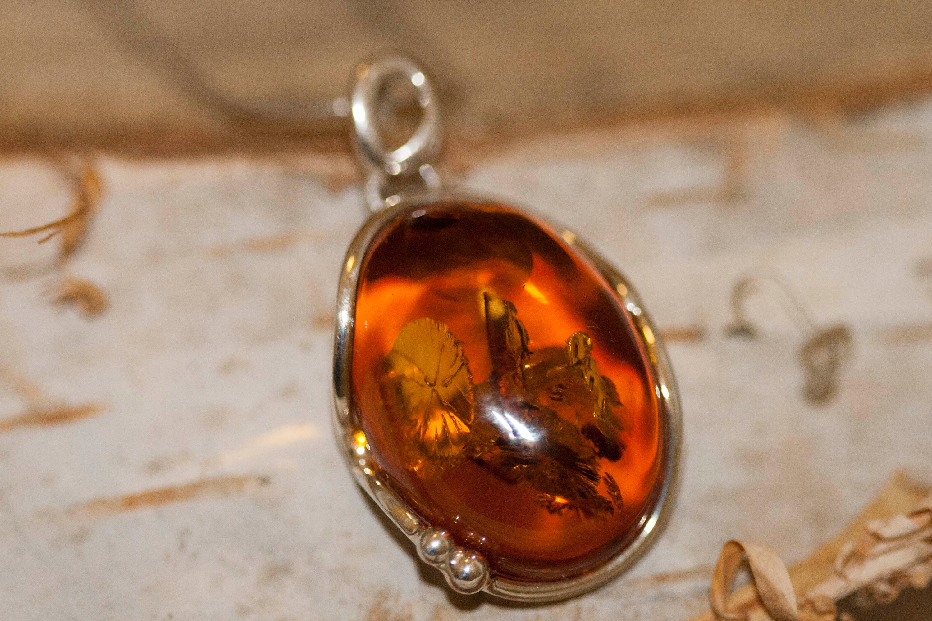 Baltic Fossil Amber Pendant in Sterling Silver Polished Cognac Amber –  AmpearlBeads