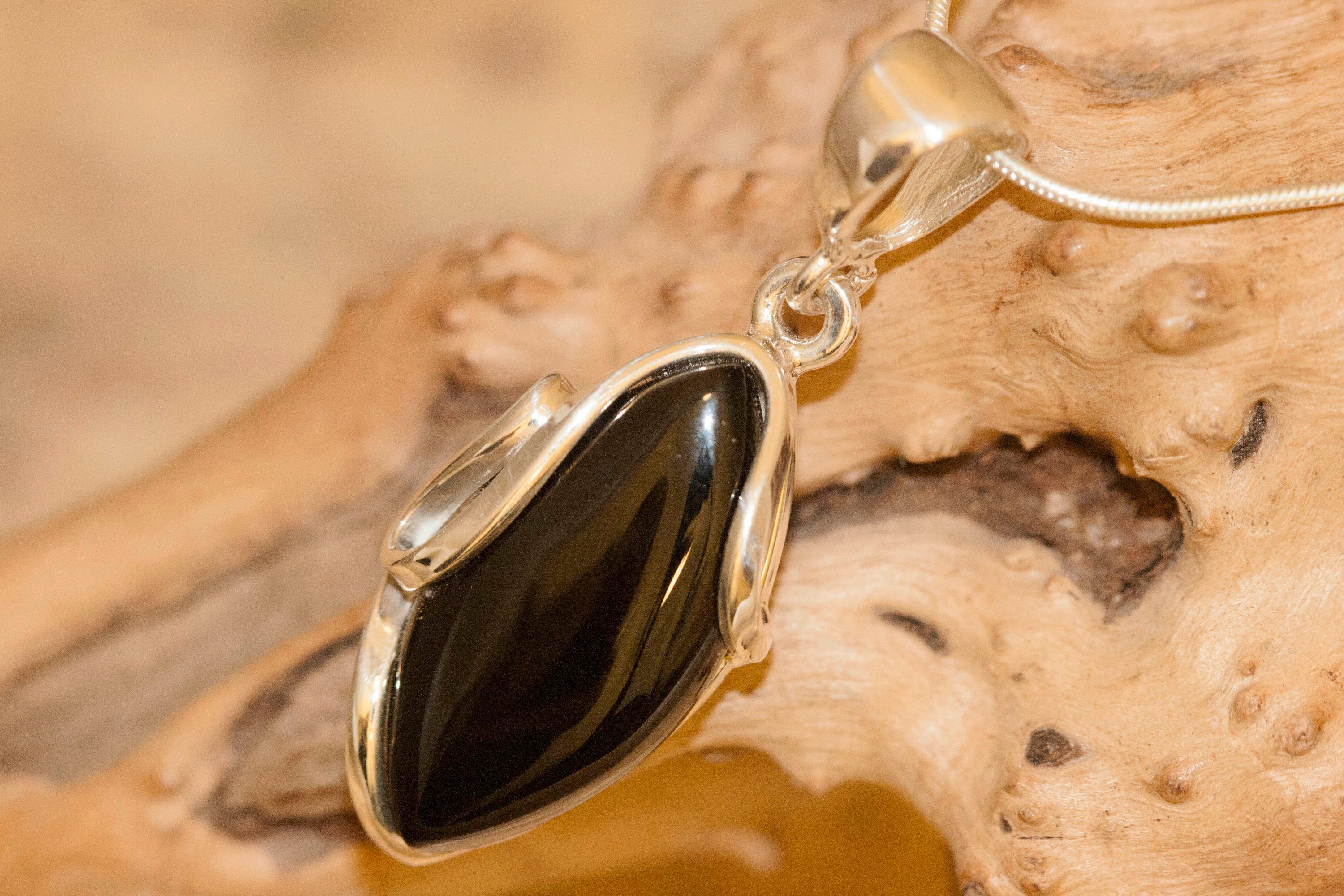 Black Onyx Pendant fitted in Sterling Silver setting. Onyx pendants