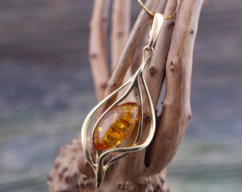 Amber & Gold. Amber pendant. Perfect gift. Modern pendant.  Golden pendant. Elegant pendant. Contemporary jewelry. Artistic jewelry. Unique