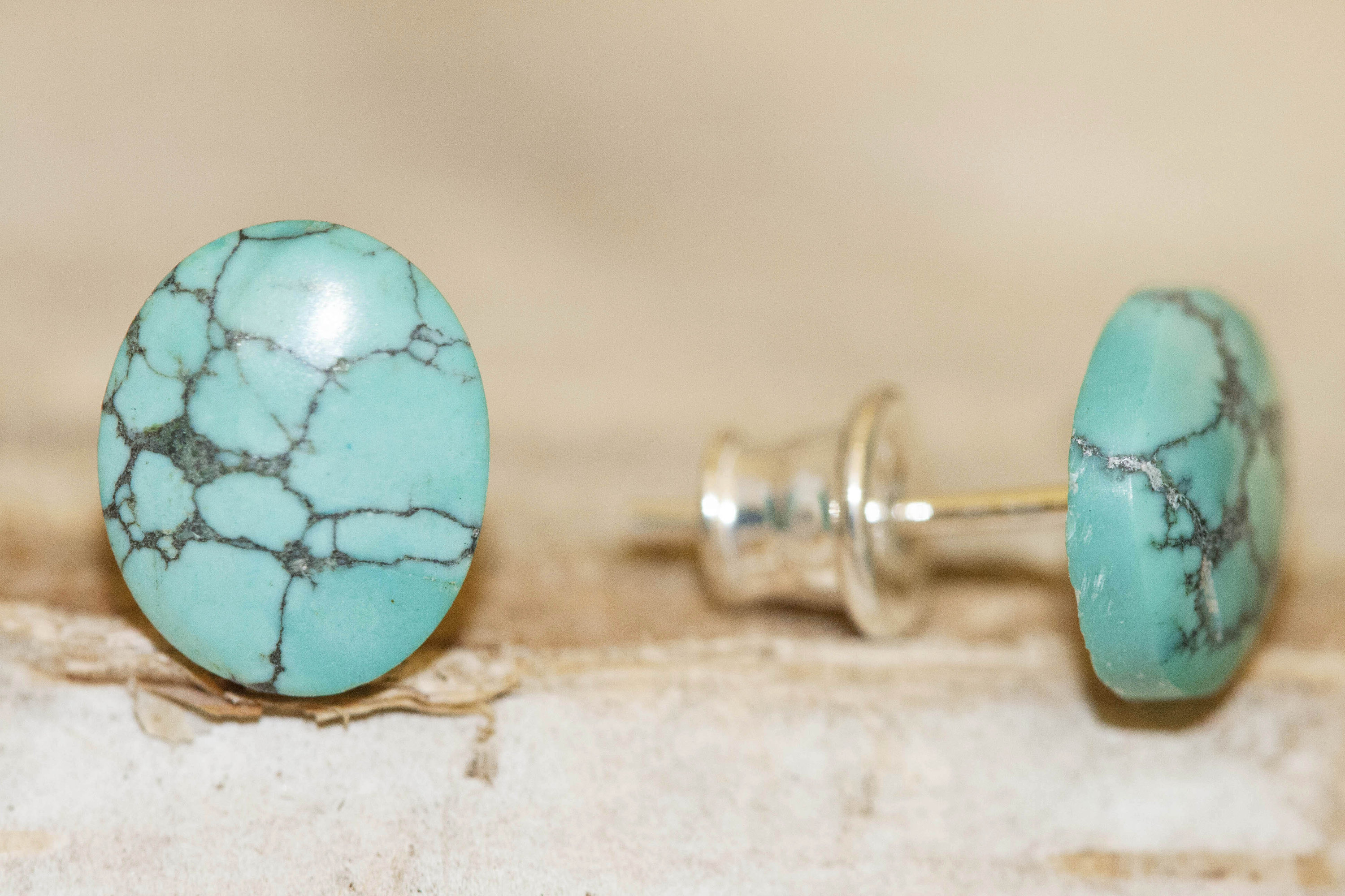 Turquoise earrings fitted in Sterling Silver setting. Blue earrings