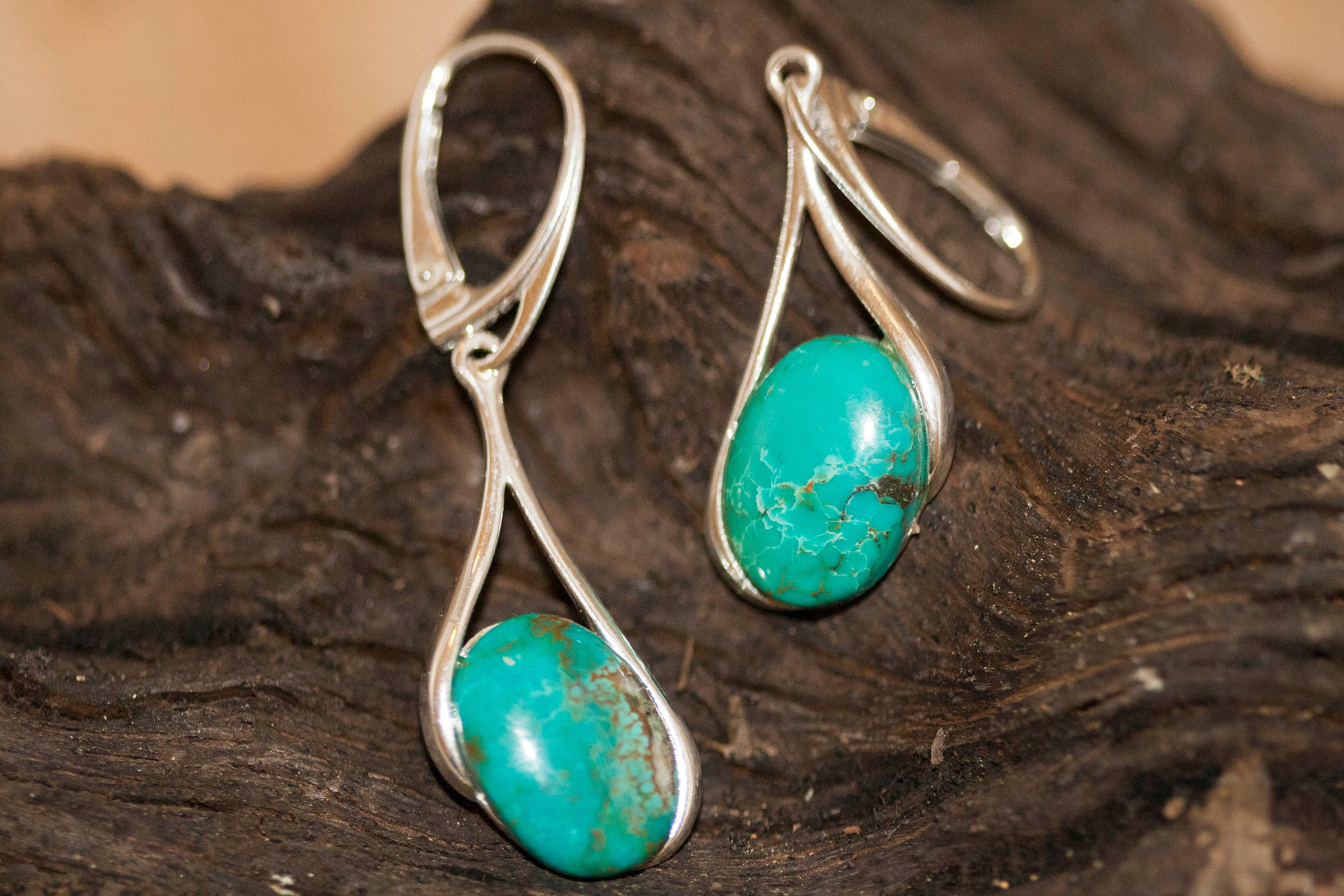 Turquoise Earrings fitted in a Sterling Silver setting. Big silver