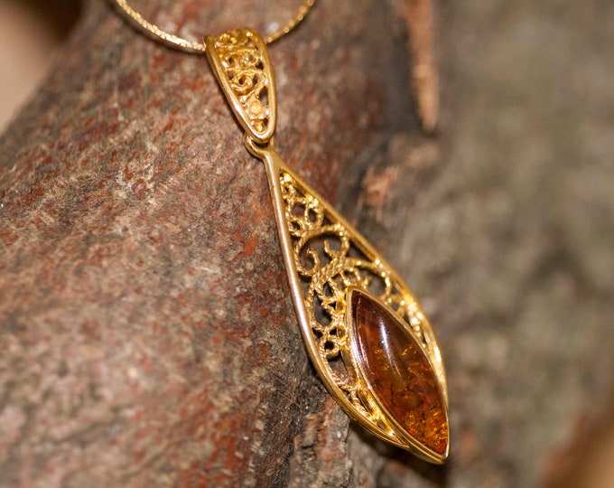 Amber & Gold. Celtic Baltic amber pendant. Golden pendant. Perfect gift. Designer pendant. Unique jewelry. Artistic pendant. Contemporary.