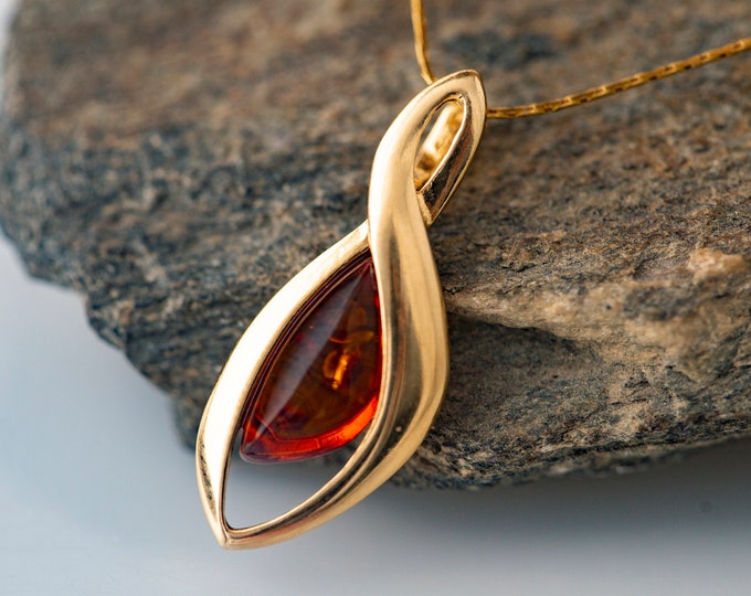 Amber & Gold. Baltic amber pendant. Perfect gift. Golden pendant. Elegant pendant. Contemporary jewelry. Artistic jewelry. Modern pendant.