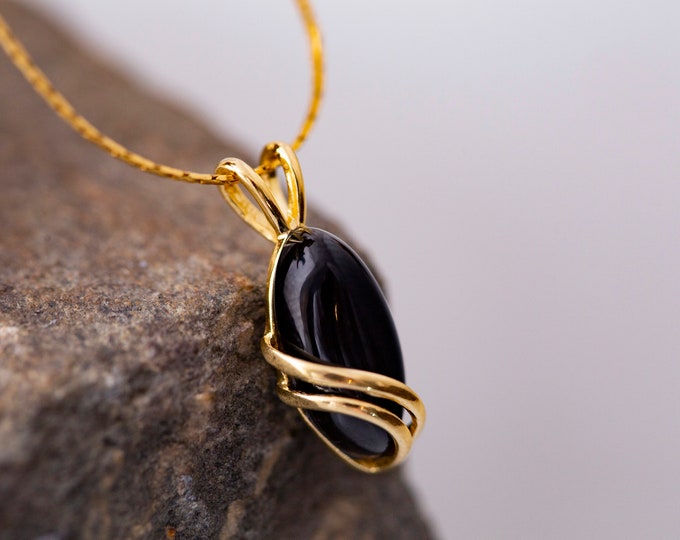 Whitby jet & Gold. Whitby jet pendant. Dainty pendant. Perfect gift for her. Gold pendant. Jet jewelry. Designer jewelry. Elegant jewelry.
