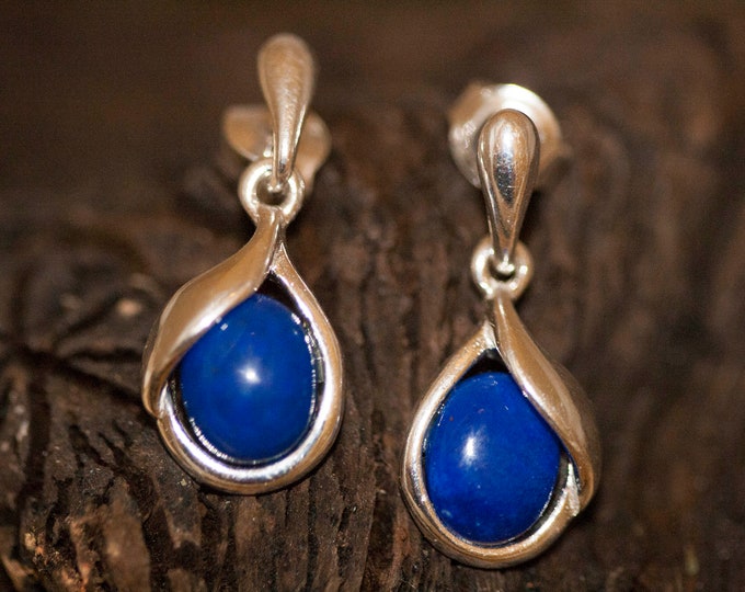 Lapis Lazuli earrings fitted in a Sterling Silver setting. Designer earrings. Elegant earrings. Blue studs. Contemporary  jewelry.
