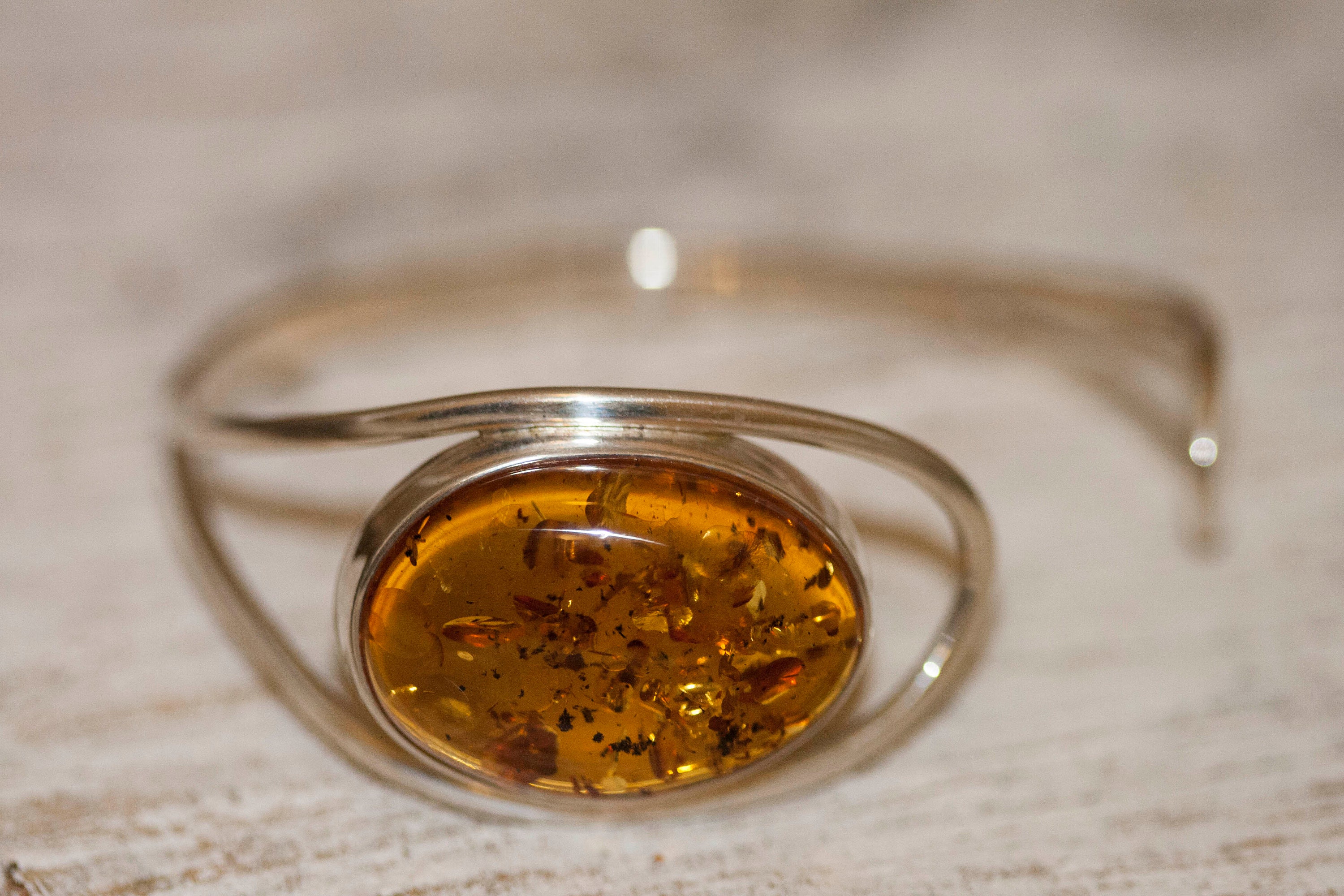 Cognac Amber bracelet. Baltic amber and sterling silver bangle bracelet