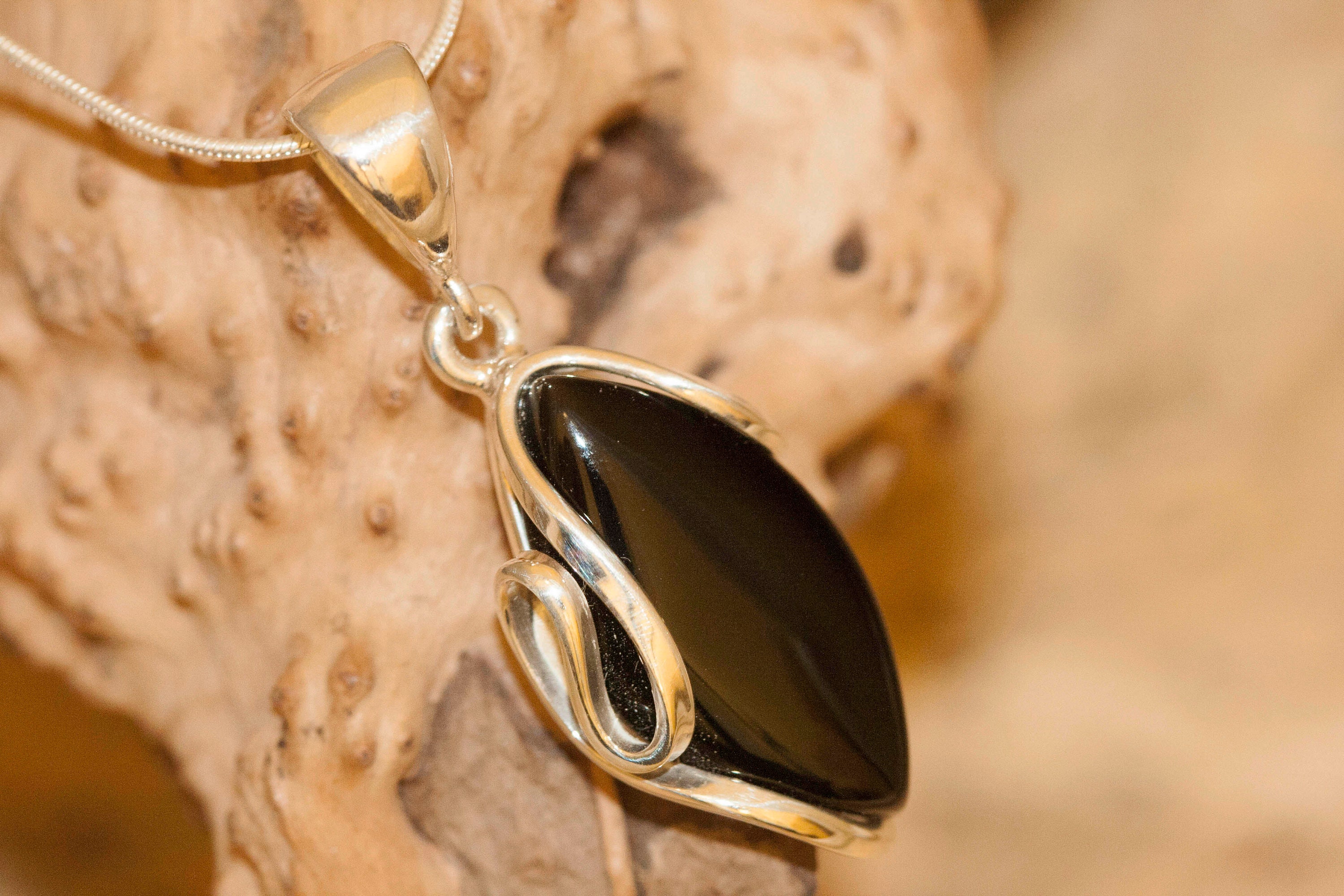 Black Onyx Pendant fitted in Sterling Silver setting. Onyx pendants