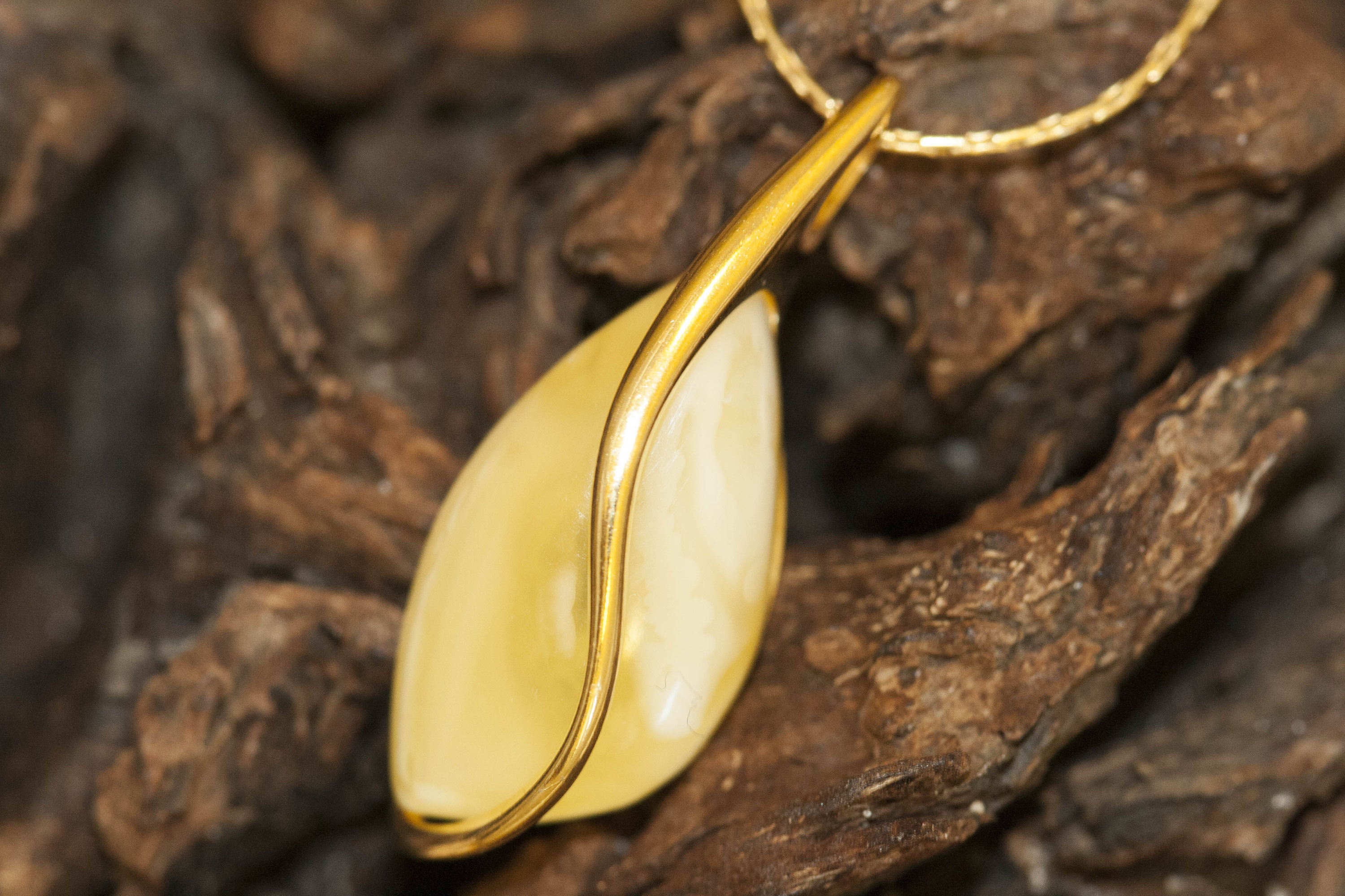 Amber and gold pendant. Milky amber pendant, gold and silver. Unique