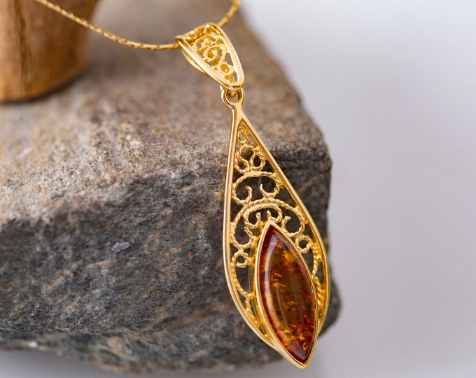 Amber and gold. Designer pendant. Amber pendant. Perfect gift. Celtic pendant. Contemporary pendant. Elegant pendant. Unique pendant.