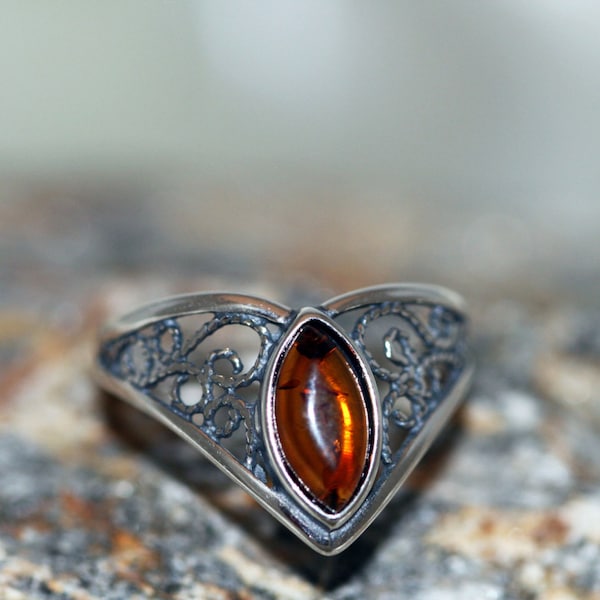 Baltic amber ring. Cognac amber fitted in sterling silver. Many sizes. Viking jewelry. Unique ring. Medieval ring. Celtic ring.