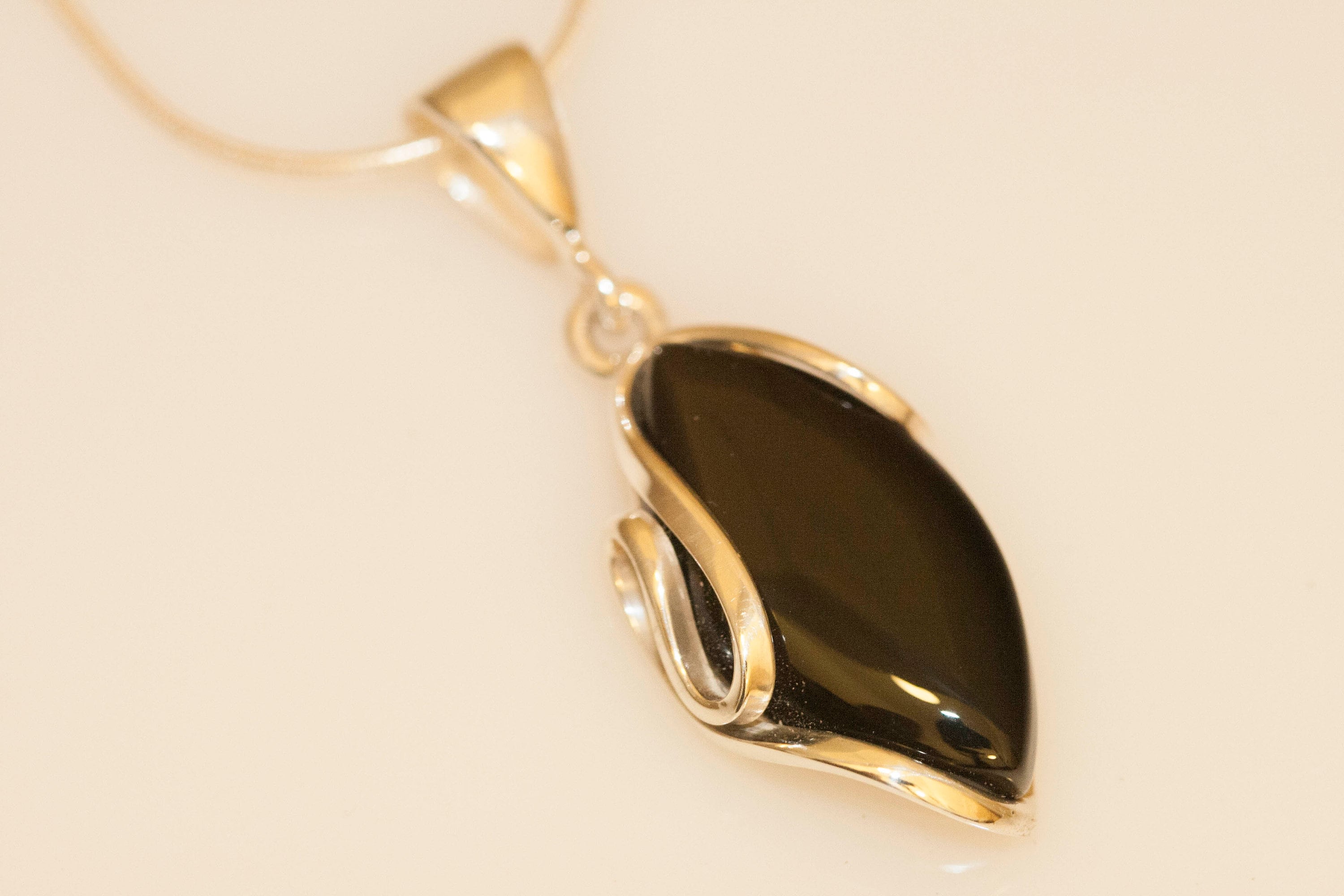 Black Onyx Pendant fitted in Sterling Silver setting. Onyx pendants