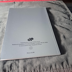 May include: A silver book with text from J-Jay Publications, Bedford Chambers, Covent Garden, London WC2E 8HA, in association with Omphalos Press. The price is listed as &pound;2.00.