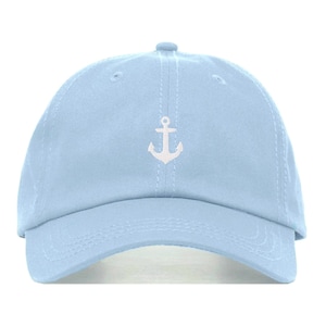 May include: A light blue baseball cap with a white anchor embroidered on the front.