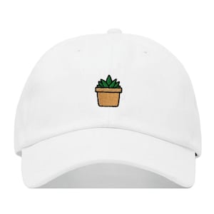 May include: White baseball cap with a small embroidered green plant in a brown pot.
