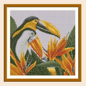 May include: Two toucans with yellow beaks and black and white bodies are perched on a branch with orange and yellow flowers. The background is a light gray.