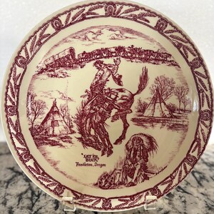 Let ‘er Buck  plate Pendleton Round Up- Rare
