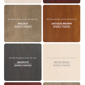 May include: Eight wood stain samples on oak and maple wood. The stains are labeled with their names and the words "Water Based Stain" and "General Finishes". The stains are: White Wash, Cabernet, Walnut, Antique Brown, Graphite, White Wash, Cabernet, Graystone.