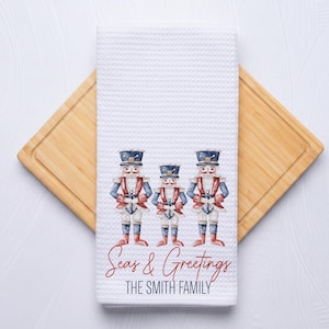 Seas and Greetings Coastal Christmas Nutcracker Hand Towel for Nautical Kitchen & Bathroom